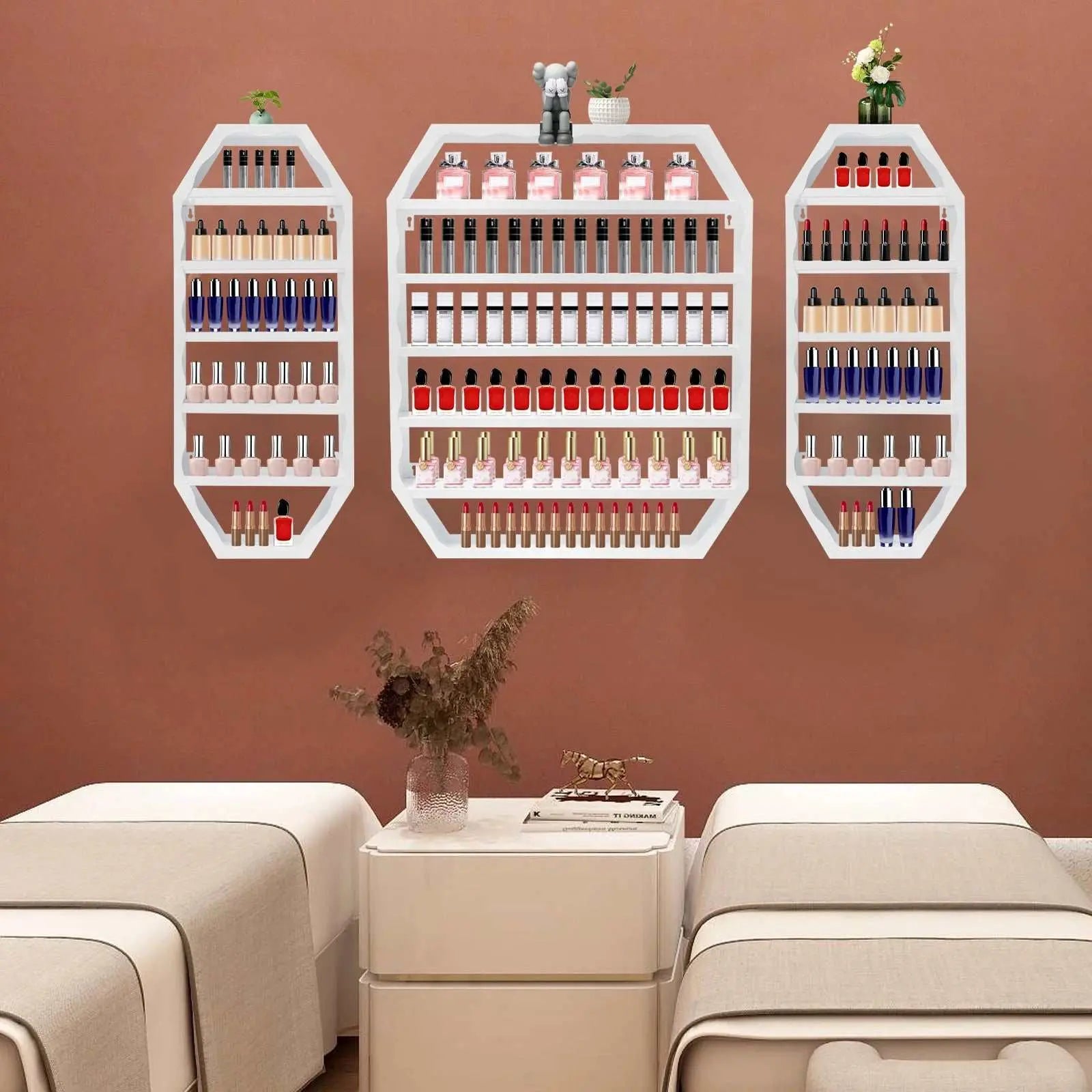 Multi-tiers wall-mounted nail polish storage racks in white, octagonal design, displaying nail polish bottles, mounted on a brown wall above two beige beds.