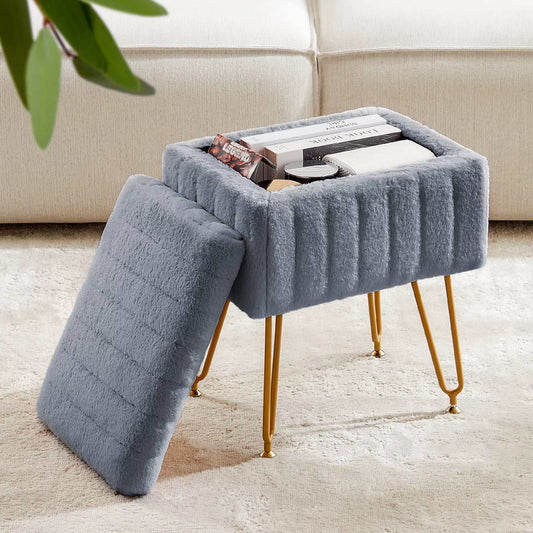 Gray faux fur storage stool with gold metal legs and removable top in living room setting