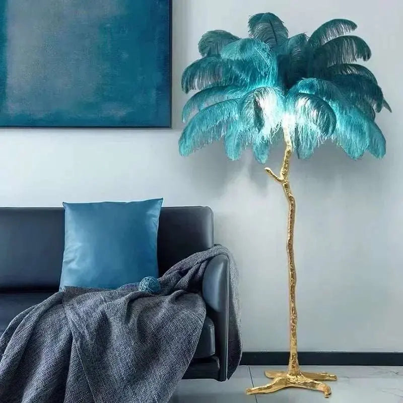 Nordic LED floor lamp with teal ostrich feather shade and gold resin stand in modern living room corner
