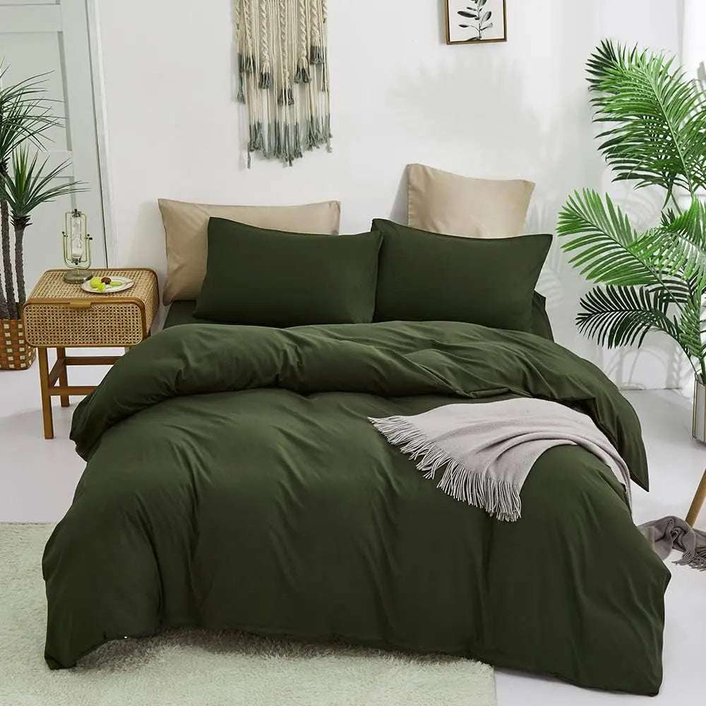 Dark green bedding comforter set with king size comforter and two matching pillowcases in a cozy bedroom setting