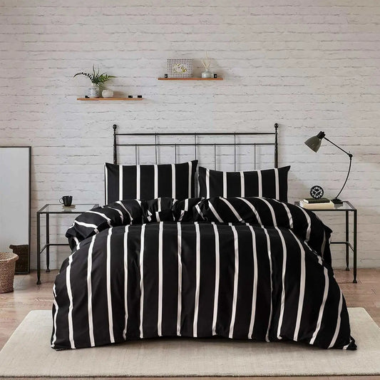 Black and white striped twin comforter set with microfiber fabric on metal bed frame in modern bedroom