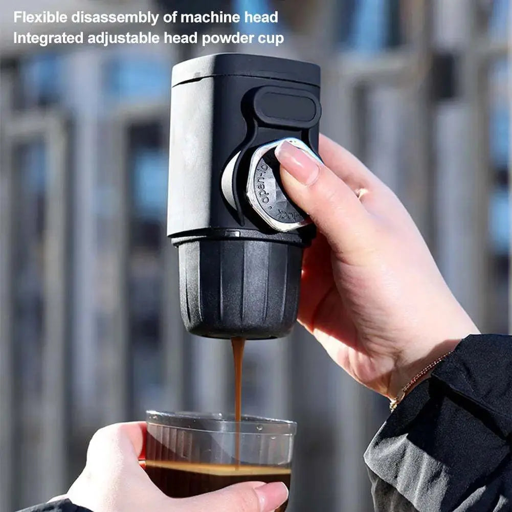 Handheld portable espresso maker pouring fresh espresso shot into clear glass outdoors