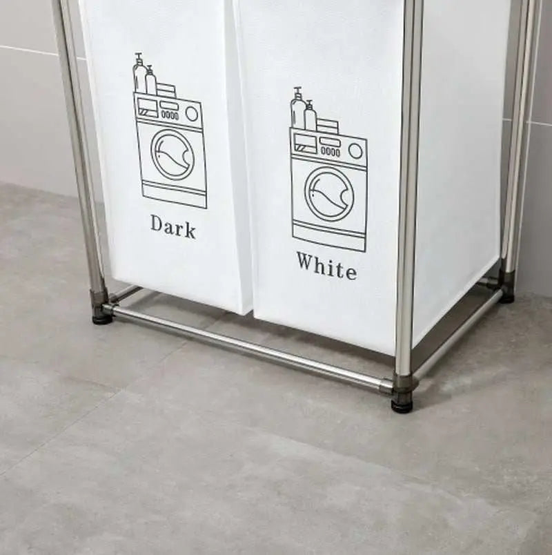 Laundry Hamper 2 Tier with black and white removable bags labeled for sorting dark and light clothes on a metal frame.