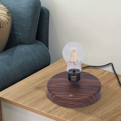 Magnetic levitating light bulb floating above wooden base on table next to sofa