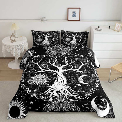 Black and white Sun and Moon comforter set featuring a large tree with sun, moon, stars, and butterfly designs on a cozy bed with matching pillowcases