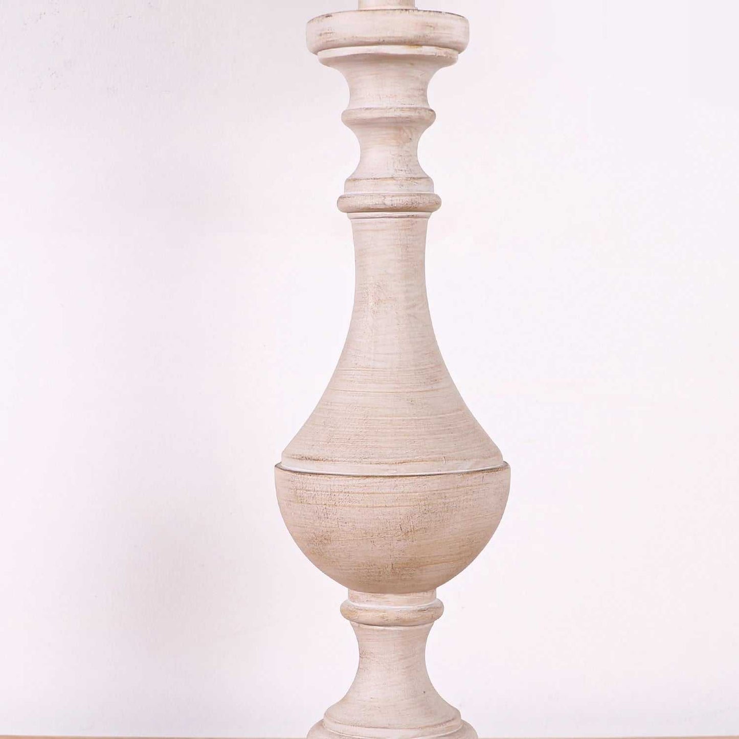 single vintage white distressed coastal candlestick table lamp base with classic silhouette