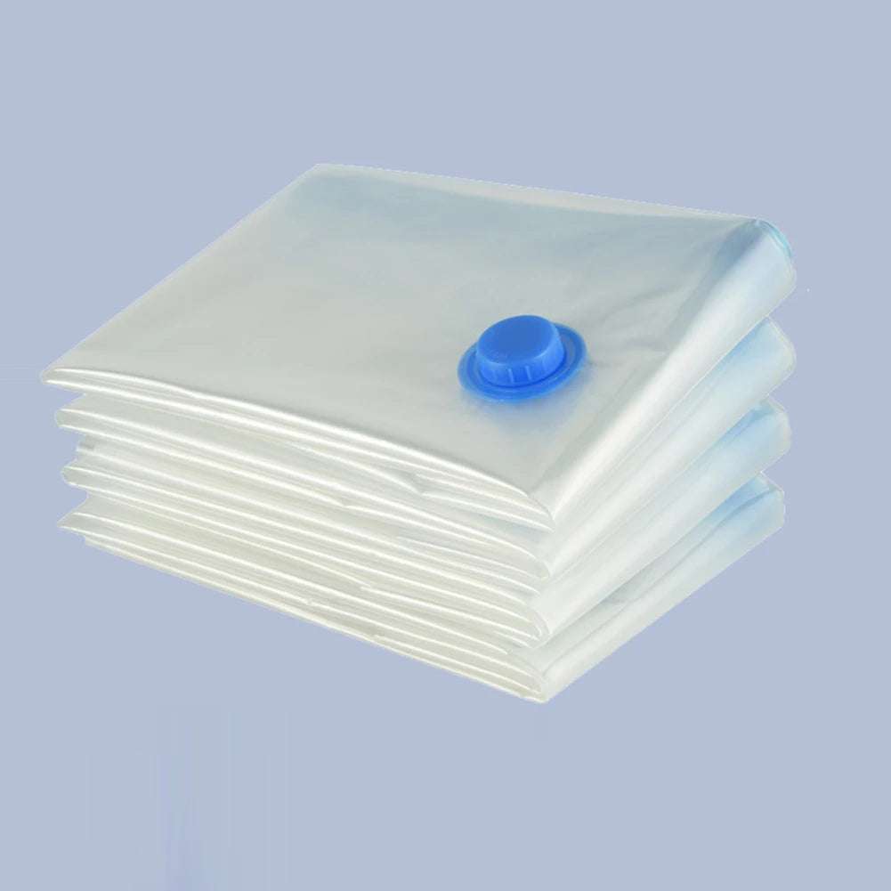 Reusable vacuum compression storage bags with blue valve for space saving and dustproof storage of clothes and bedding