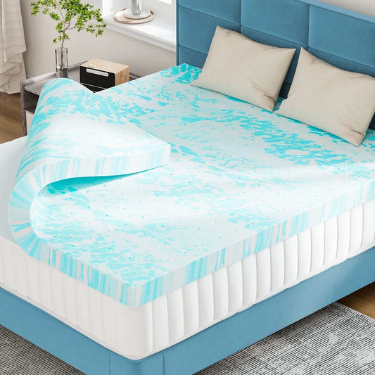 3-inch cooling gel memory foam mattress topper on bed with blue upholstered headboard and beige pillows