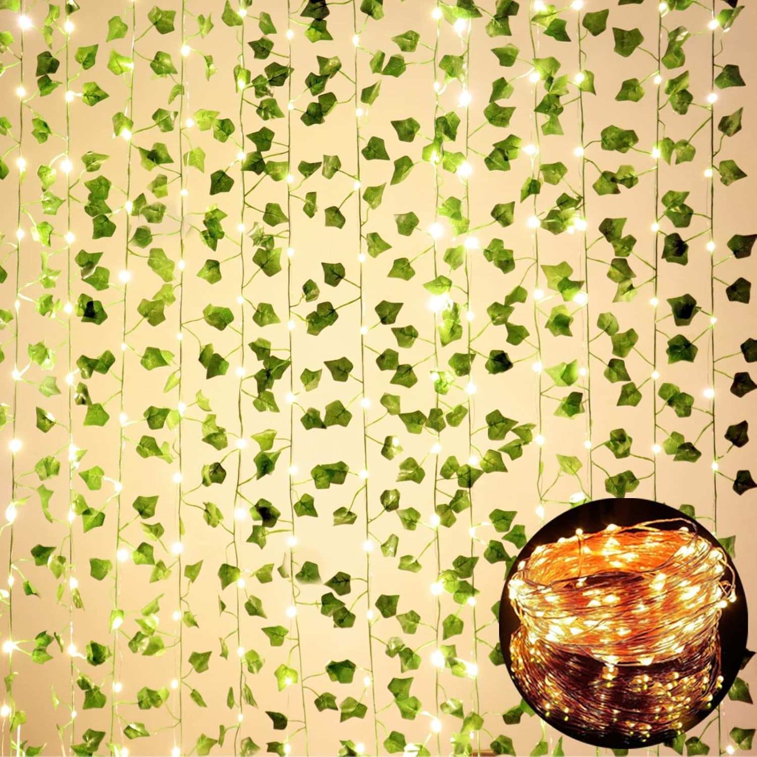 12 pack fake vines with LED string lights hanging for room decor, artificial green ivy leaves on plastic strands creating a natural aesthetic ambiance.
