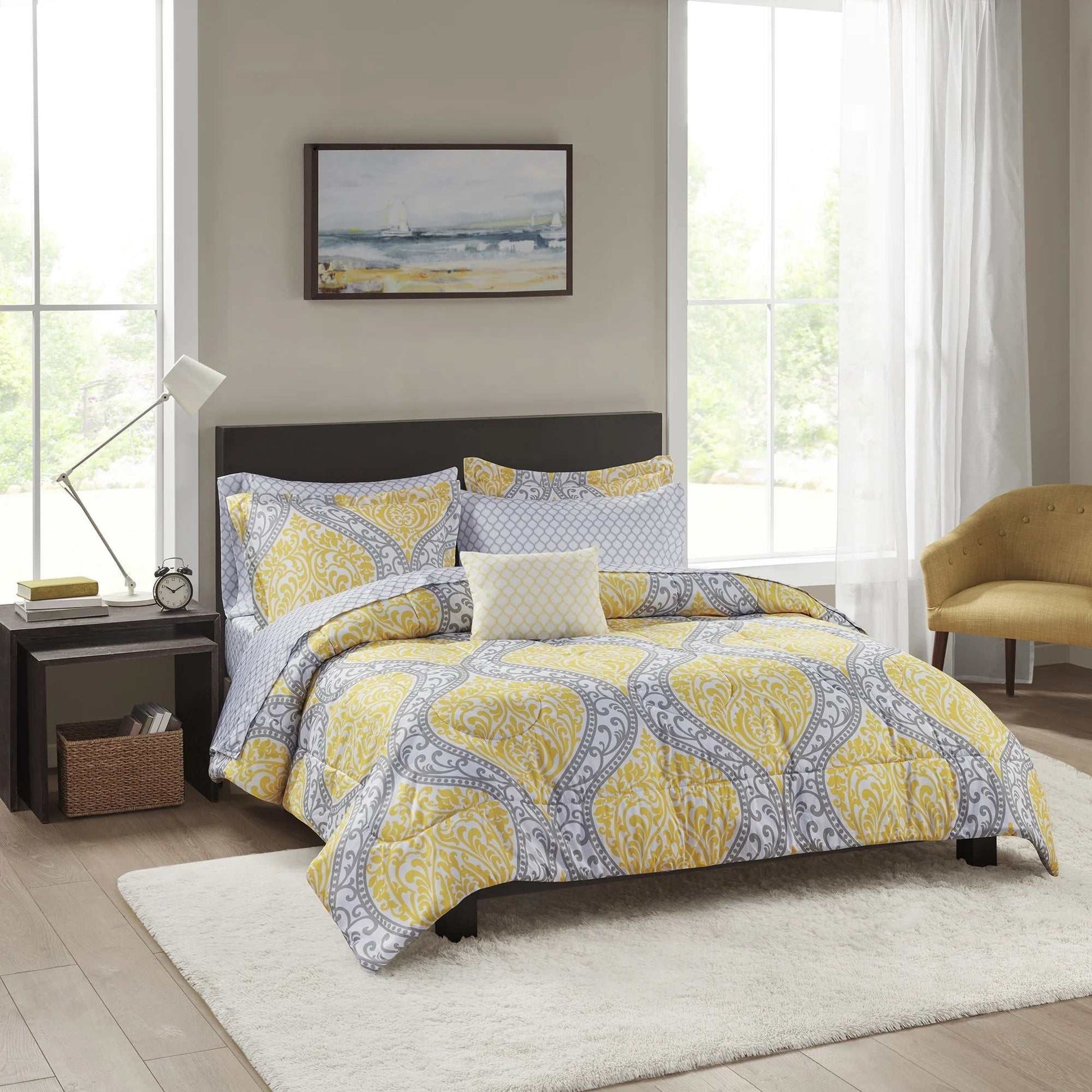 Yellow Damask Bed in a Bag bedding set with vibrant yellow and gray damask pattern on comforter, sheets, shams, and decorative pillow in a modern bedroom setting