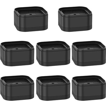 Set of black heavy-duty plastic furniture risers for bed, chair, and table height adjustment with non-slip base.