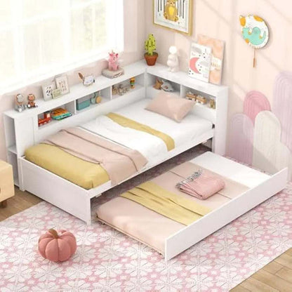 White twin daybed with pull-out trundle, reversible bookshelf headboard, and bedside storage shelves in a children's bedroom