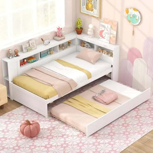 White twin daybed with pull-out trundle, reversible bookshelf headboard, and bedside storage shelves in a children's bedroom