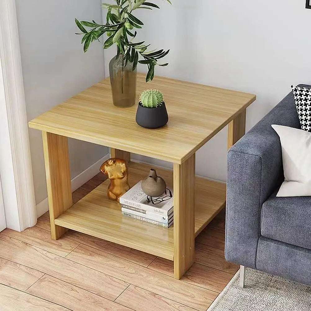 Simple wooden bedside table with double-layer shelf, decorative plants on top, next to gray sofa in living room